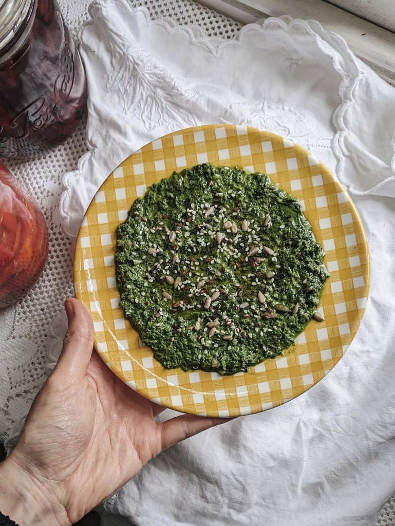 nettle pesto on a gingham plate